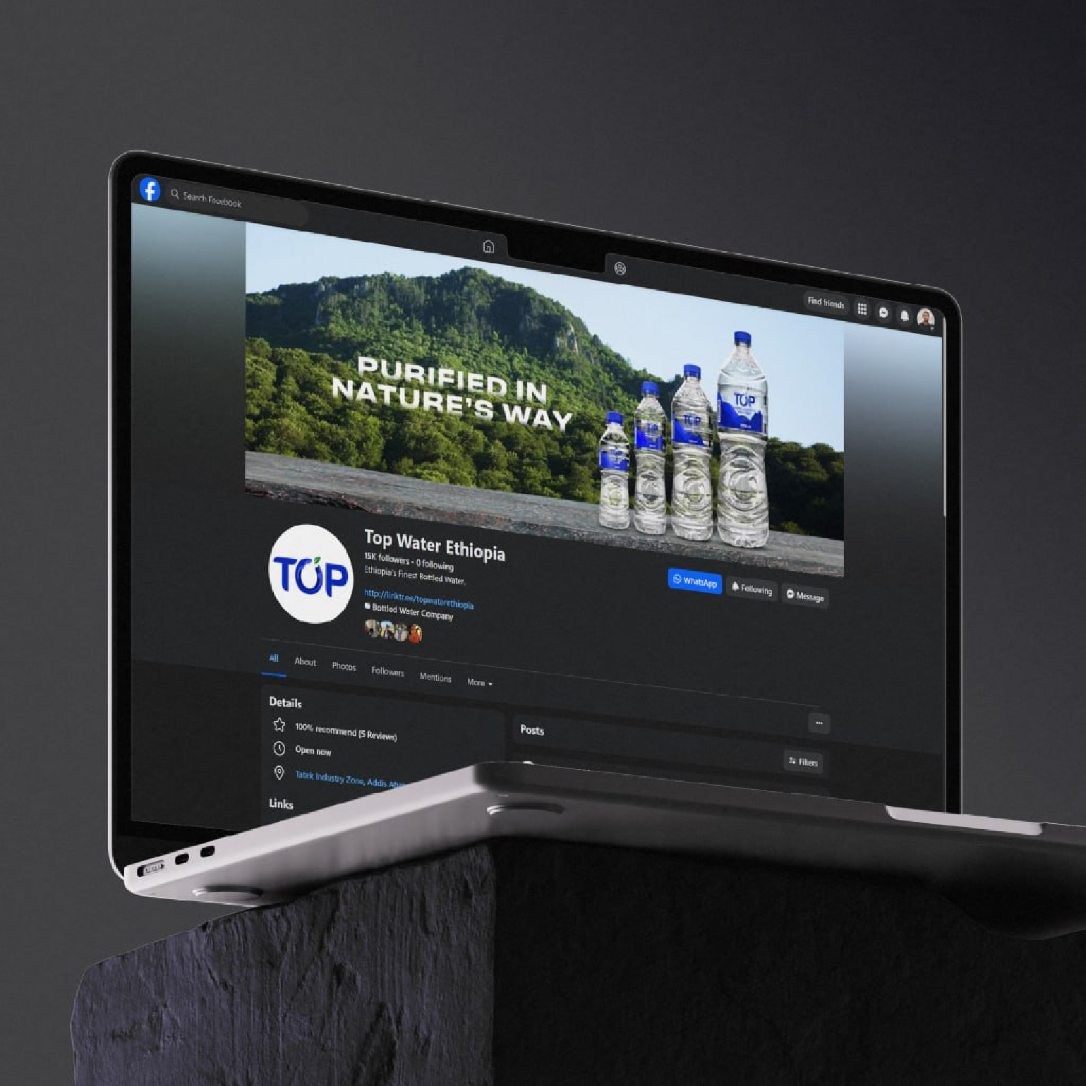 TOP Water Ethiopia Facebook page cover mockup on a laptop screen